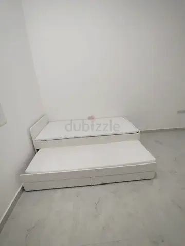 Slakt bed under bed with 2 Ikea mattresses and 2 storage drawers underneath