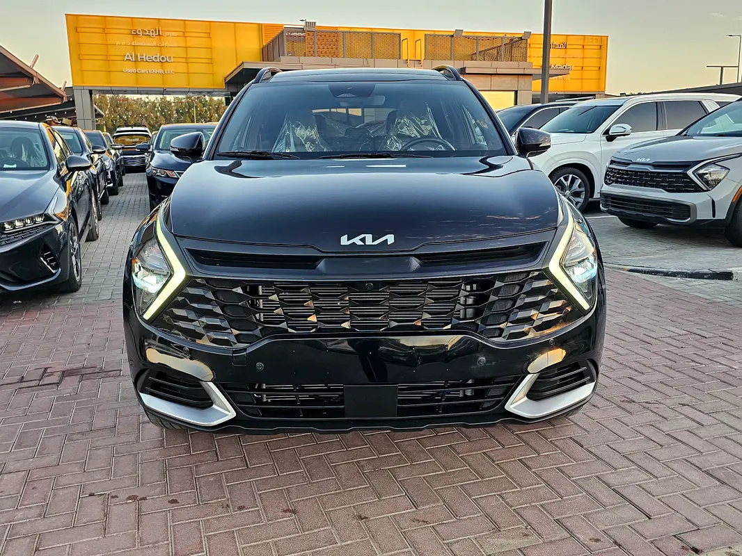 Kia Sportage 2023 — photo 1 of 19