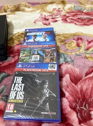PS4 pro 1 TB Video Game Bundle: The Last of Us Remastered  Cricket 19