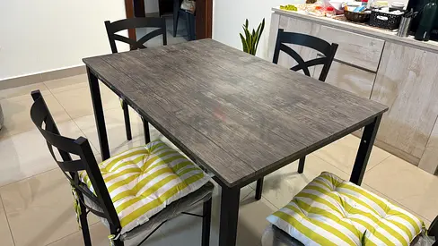 Table including 4 chairs for sale