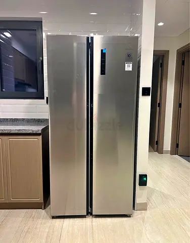 Brand new Electrolux fridge, never used, still with all the protection covers on