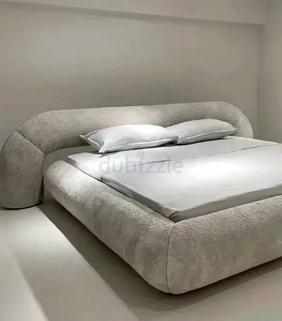 Modern Plush Bed with Curved Design