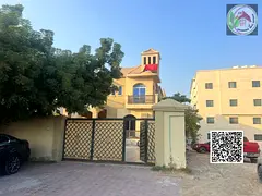A luxurious and fully equipped villa in Al Rawda, with a large area, ideal layout, and clean finishi