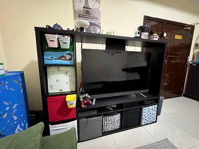 Ikea tv stand along with toshiba TV 55 inch