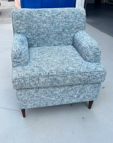 Cozy Blue Accent single seater sofa with Wooden leg with supporting Cushions .