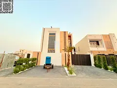 A luxurious, modern villa with a full stone facade and an exceptionally opulent interior featuring h