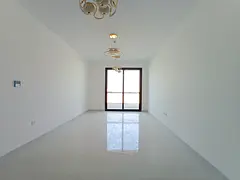 Brand new luxury 2BR with baloney parking free in tilal city sharjah