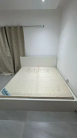 Bed with mattress