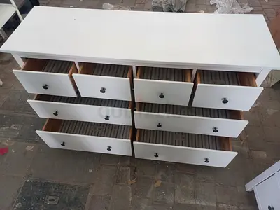 Modern White dresser with multiple drawers