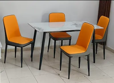 Modern Dining Table Set with Stylish Orange Chairs