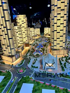 A 3 bedroom apartment in the most beautiful Tiger Downtown Ajman project, in a strategic location, w