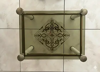 Elegant Vintage Glass Coffee Table with Ornate Etched Design