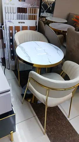 Elegant Marble Top Dining Table with Stylish Chairs