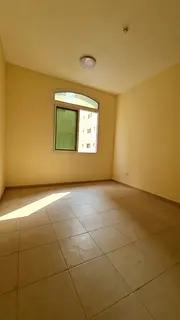 2-bedroom apartment with living room in Al Qulaya, Sharjah. Free gym and pool, prime location near a