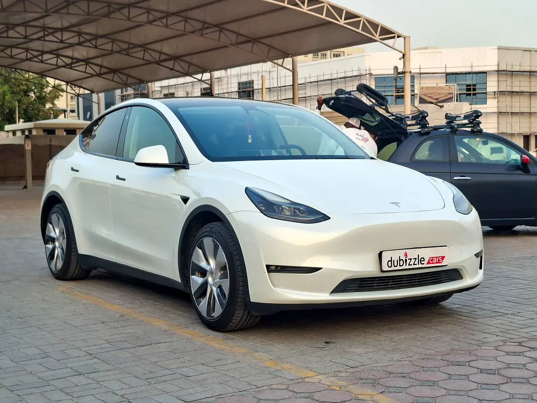 Tesla Model Y 2024 — photo 1 of 14