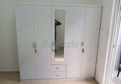 Stylish White Wardrobe with Mirror and Drawers