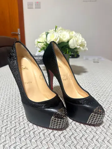 Christian Louboutin Black Leather and Pony Hair Maggie Pumps