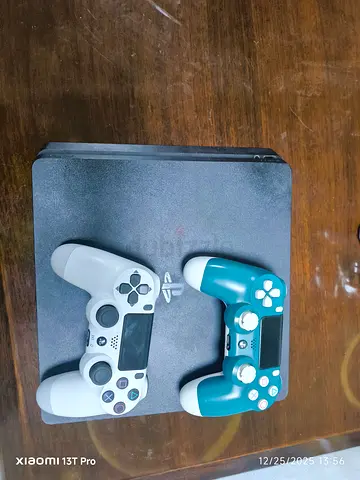 PlayStation 4 slim 1000GB Console with Two Controllers