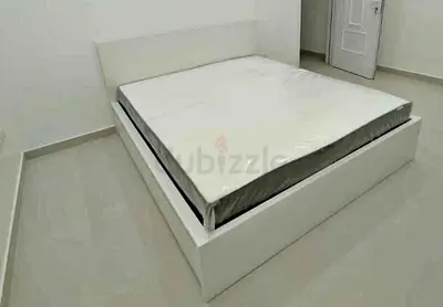 IKEA malam king‑size bed (180 × 200 cm) with 2 storage drawers underneath and an IKEA mattress