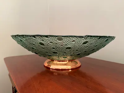Decorative glass bowl with copper base