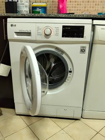 LG like new washing machine very good working 7 kg delivery with warranty