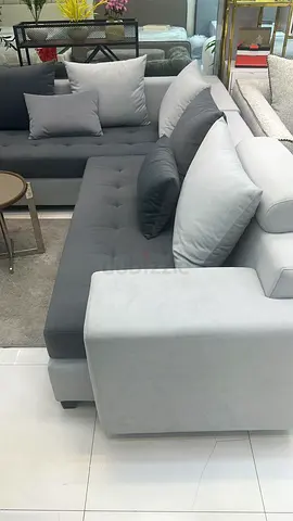 Elegant Grey Sectional Sofa with Plush Cushions