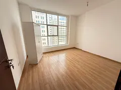 The most beautiful and luxurious two-bedroom apartment with a living room in Al Majaz – free parki