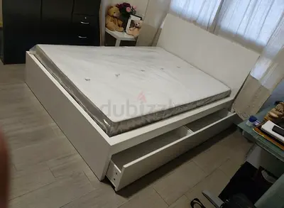 IKEA queen‑size bed (160 × 200 cm) with 2 storage drawers underneath and an IKEA mattress