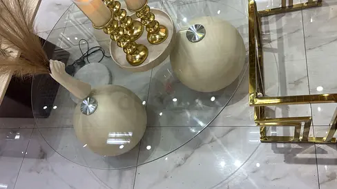 Elegant Glass Top Coffee Table with Unique Base