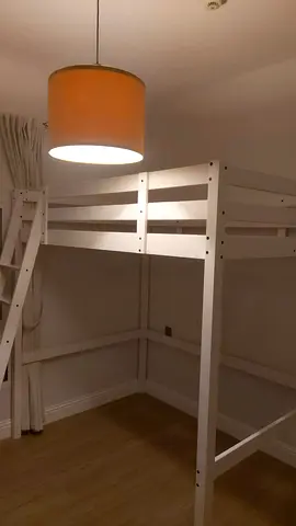 Stylish White Loft Bed with Unique Lamp