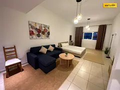 Furnished studio apartment with hotel-style furnishings in Ajman, Al Rashidiya area