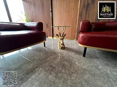 Family building with modern finishes, excellent location opposite Ajman University