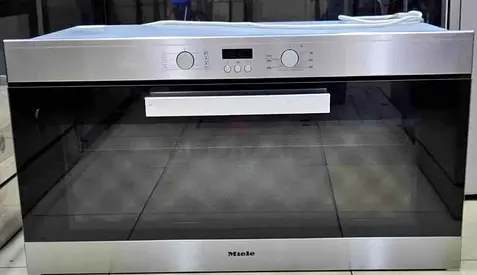 Miele brand built in Electric oven same like new free delivery with warranty