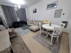 "1-bedroom apartment with a living room for monthly rent in Al Yasmeen Towers, Al Garf 2. Very 