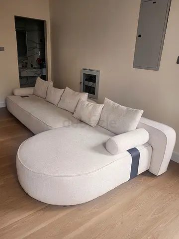 Comfortable L-Shaped Sofa in Soft Beige Fabric