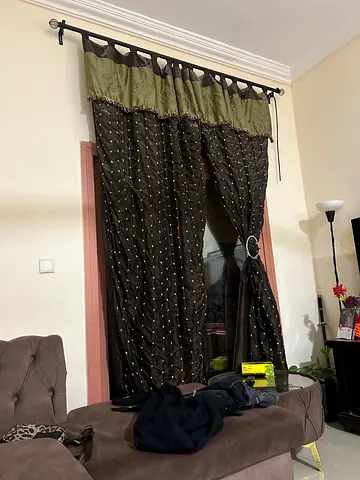 Elegant Brown Drapes with Green Trim