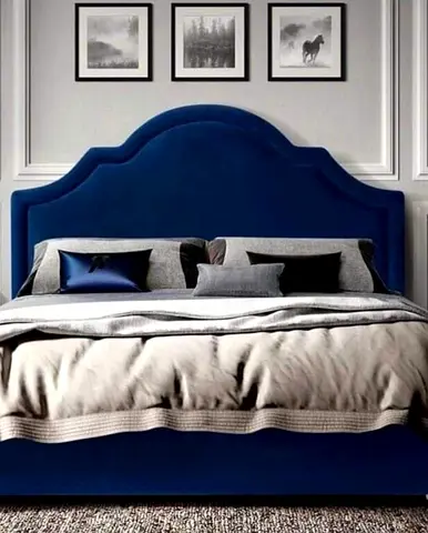 Elegant Blue Upholstered Bed with Stylish Bedding