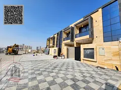 Villa for sale in Ajman, Al Helio area. 4 master bedrooms, majlis, living room, and maid's room.