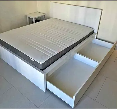 IKEA malam double‑size bed (140 × 200 cm) with 2 storage drawers underneath and an IKEA mattress