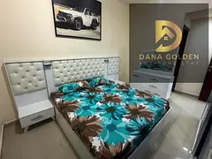 Two bedrooms, a living room, and a maid's room for rent in Sharjah Al Taawun,