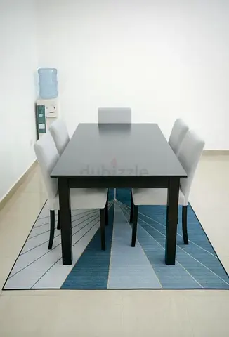 Modern Dining Table with Stylish Chairs