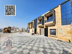 Villa for sale in Al Helio area, Ajman. Modern design. The villa includes registration fees and feat