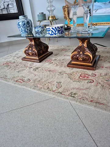 Coffee table with antique pedestals