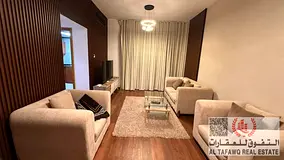 A furnished apartment consisting of a bedroom, a living room, a bathroom, and a balcony with an exte