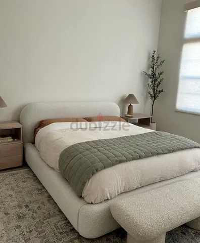 Modern Upholstered Bed in Cream Fabric With Cozy Accents