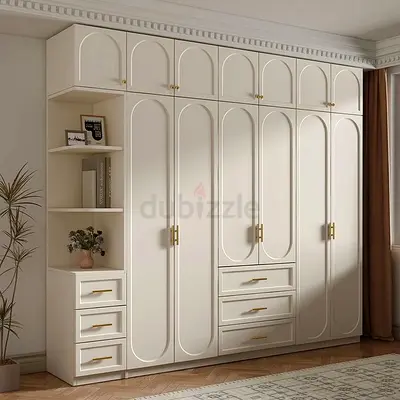 Elegant White Wardrobe with Shelves and Drawers