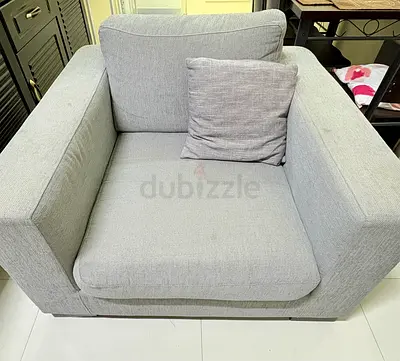 Comfortable Gray Armchair with Cozy Cushion