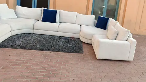 Looks great Condition Chattels and More U Shape Sofa Beige