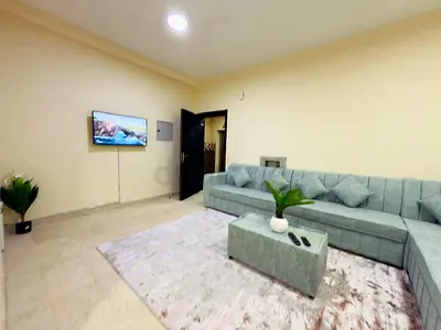Modern L-Shaped Sofa with Elegant Rug