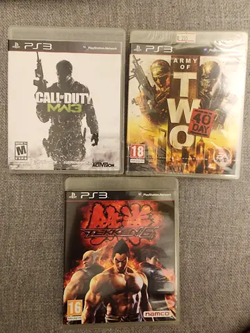 Collection of PS3 Games: Army of Two, Call of Duty MW3, and Tekken 6